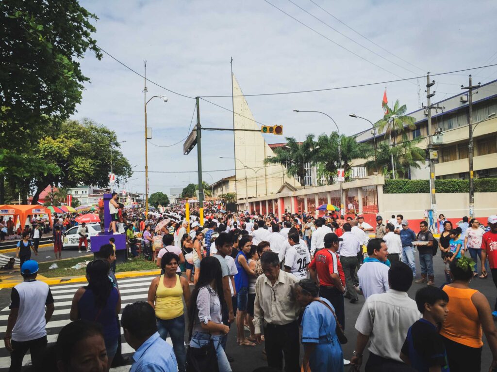 Locals gather in the main square in Iquitos, Peru. 